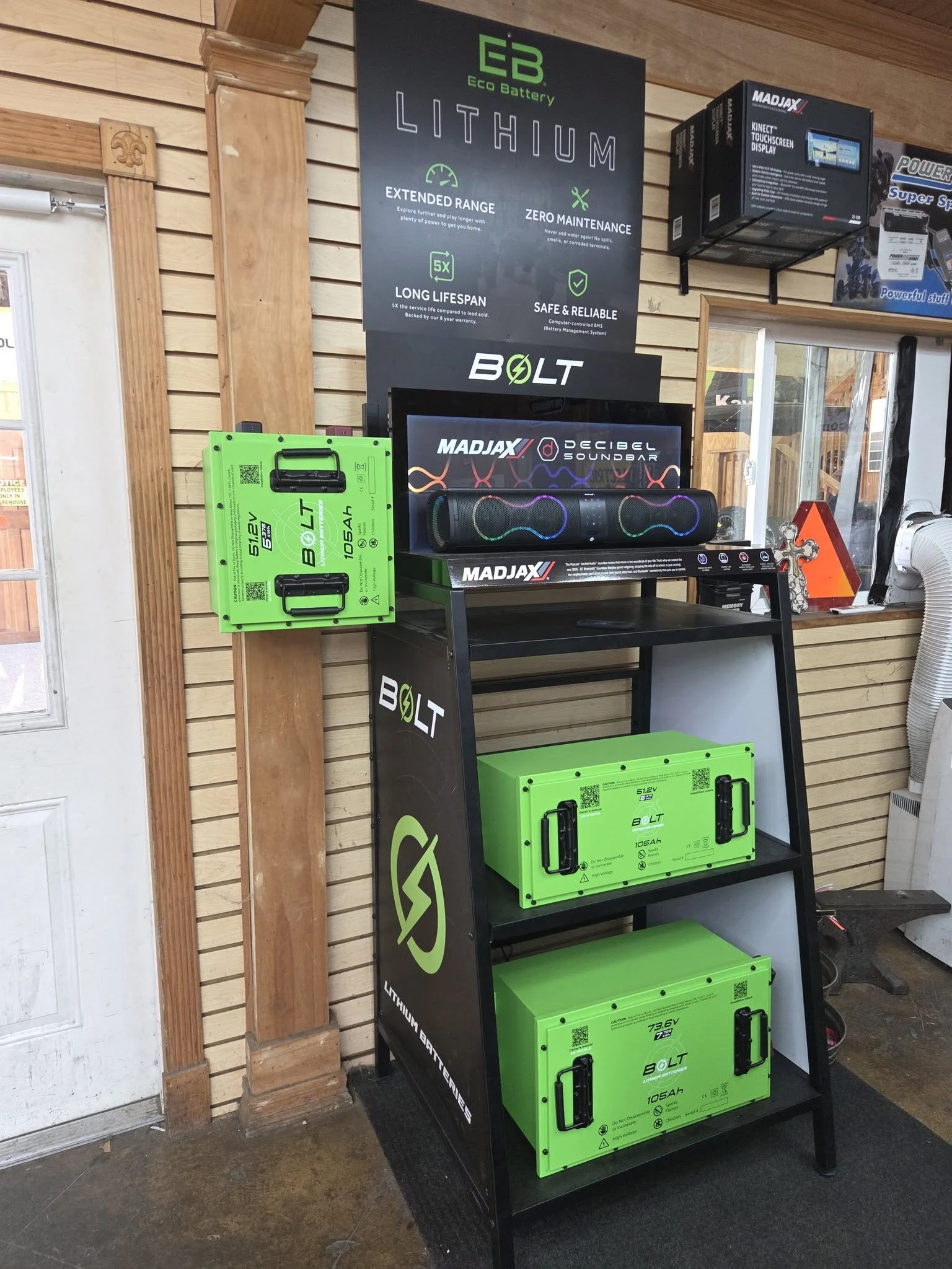 Green lithium batteries and audio accessories on display at Gayle Battery